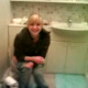 A blonde girl is seen shitting while sitting on a toilet. She then wipes her ass and moons for the camera. Unfortunately, the person filming puts her hand over the lens during the best parts.